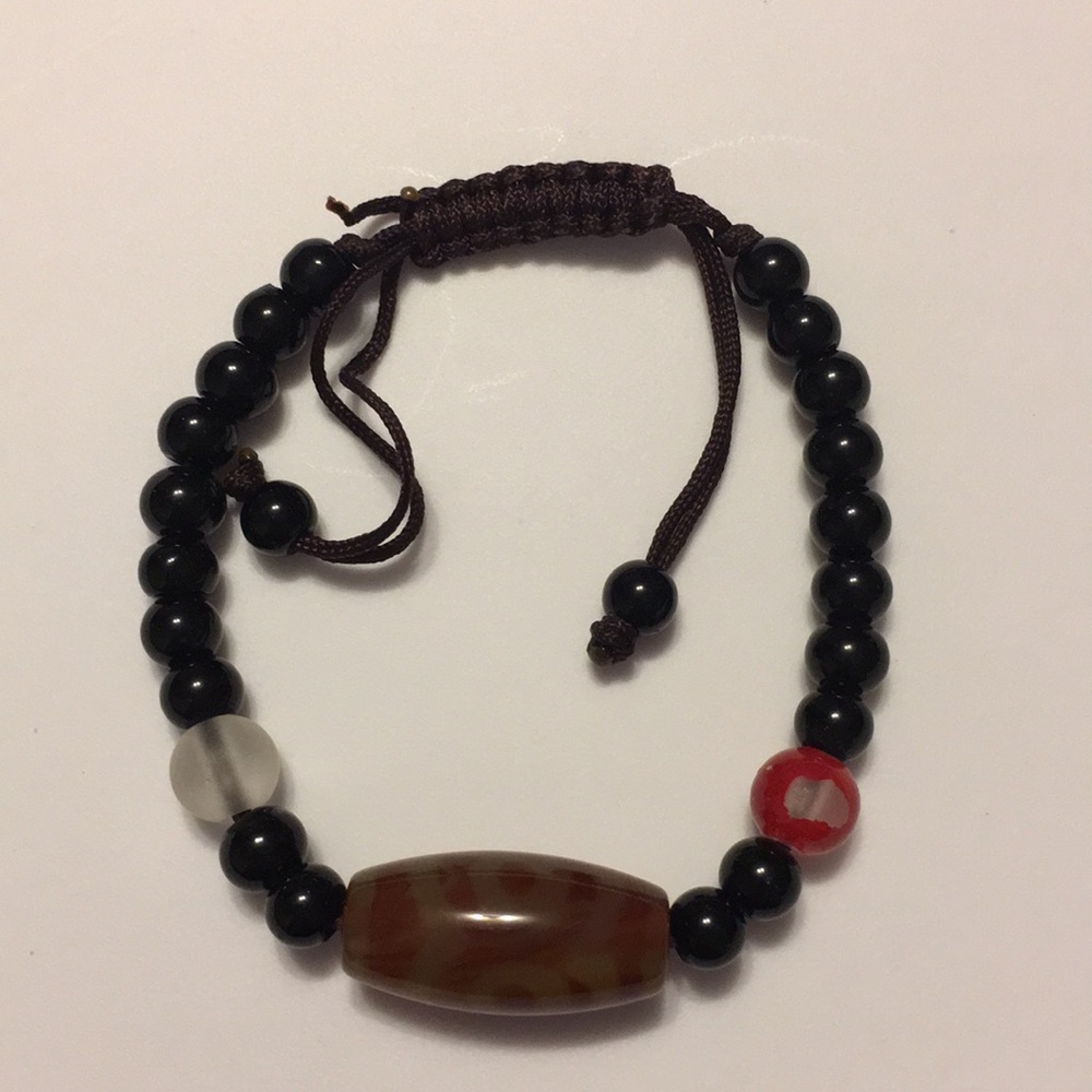 Ladies black onyx rope tie bracelet
